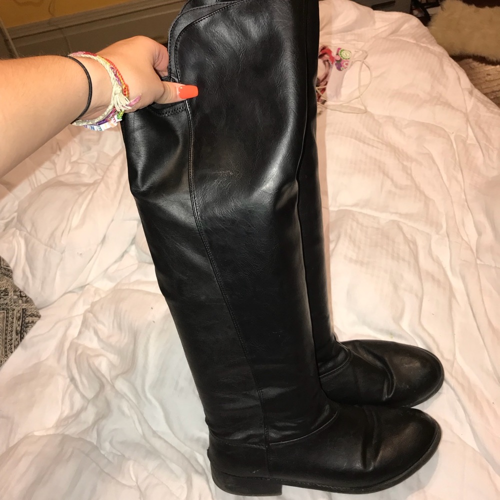 Over the knee black leather boots